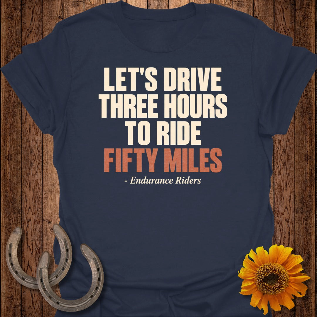 Navy t-shirt with text "LET'S DRIVE THREE HOURS TO RIDE FIFTY MILES".