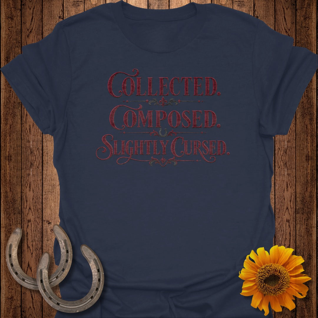 Navy t-shirt with "Collected. Composed. Slightly Cursed." text.