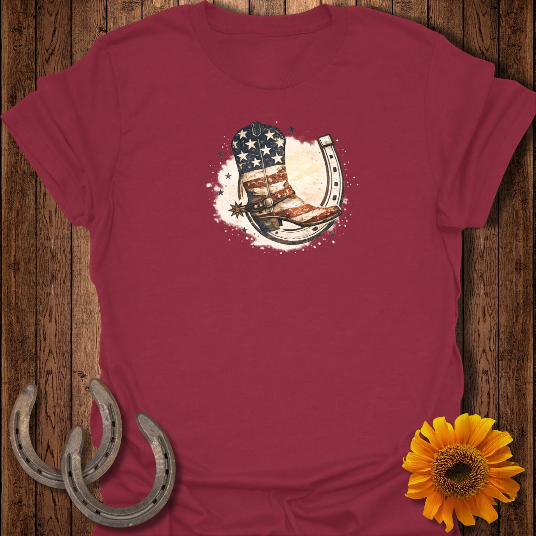 Cowboy boot with US flag pattern inside a horseshoe.