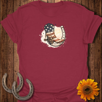 Cowboy boot with US flag pattern inside a horseshoe.