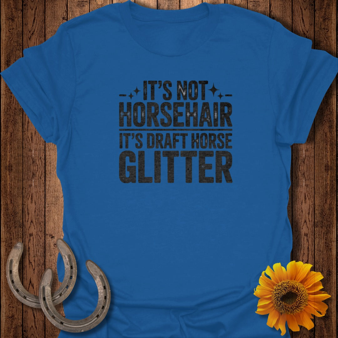 Blue t-shirt with text "It's Not Horsehair, It's Draft Horse Glitter".