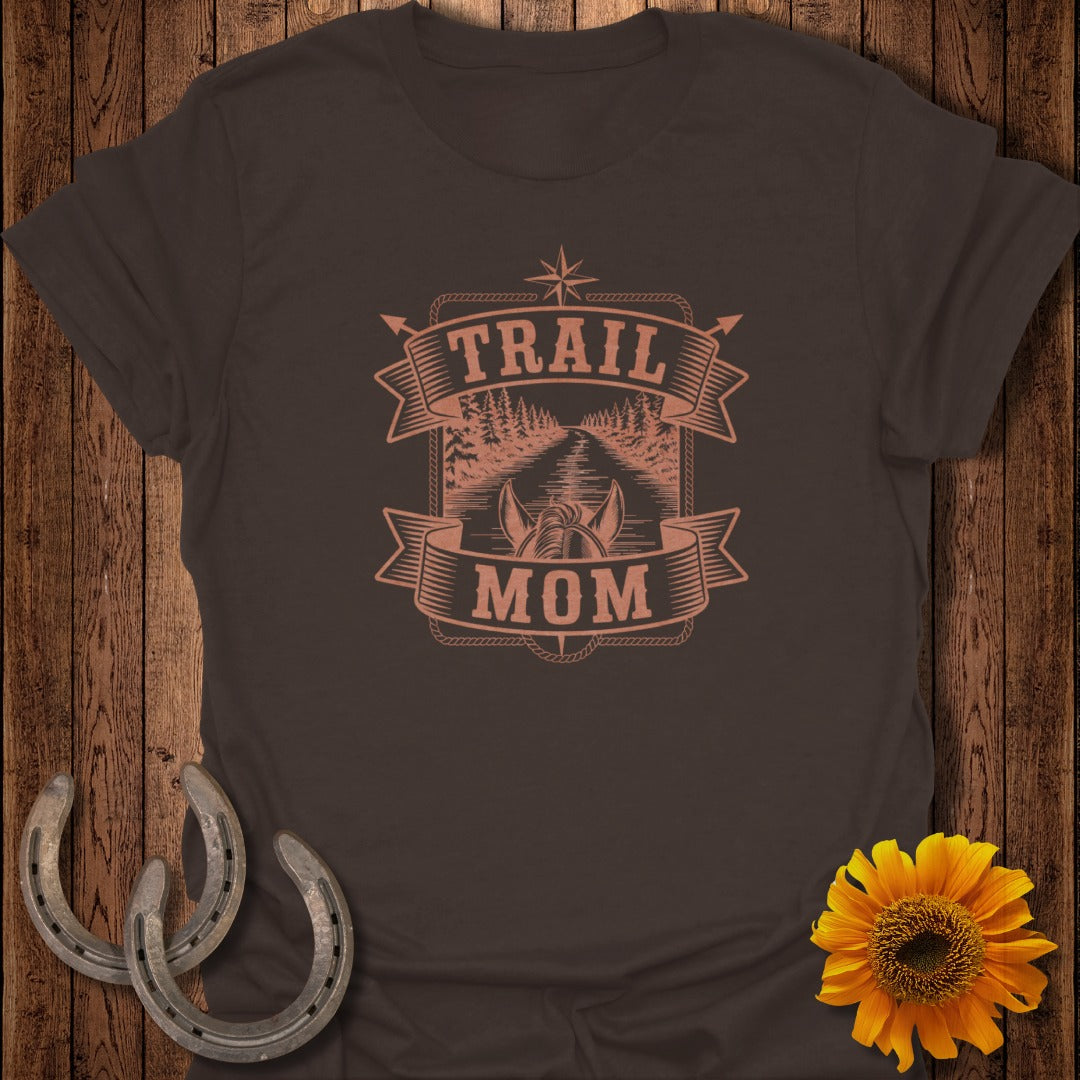 Brown t-shirt with "Trail Mom" text and a forest road graphic.
