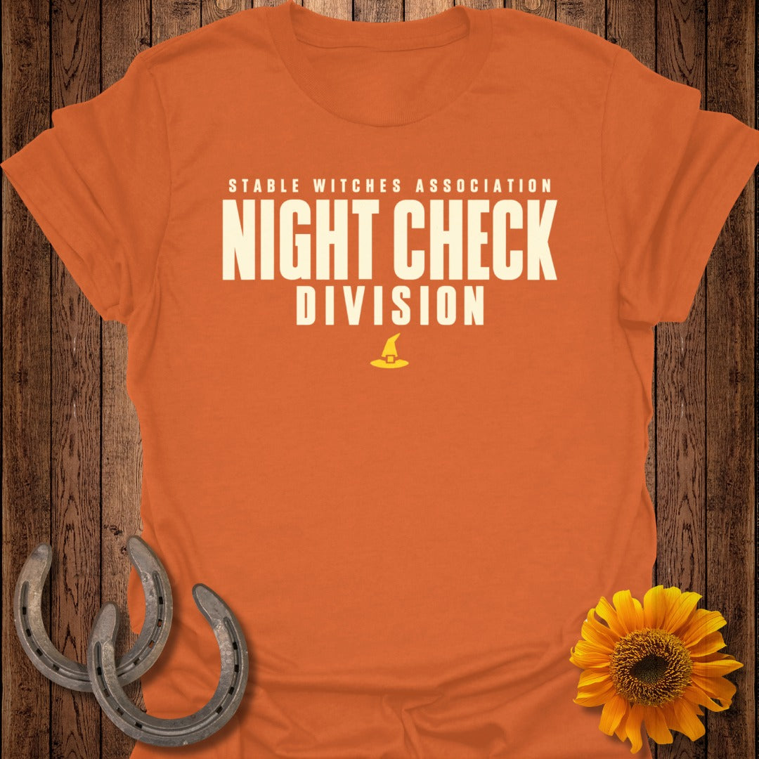 Orange t-shirt with "Stable Witches Association Night Check Division" text and hat graphic.