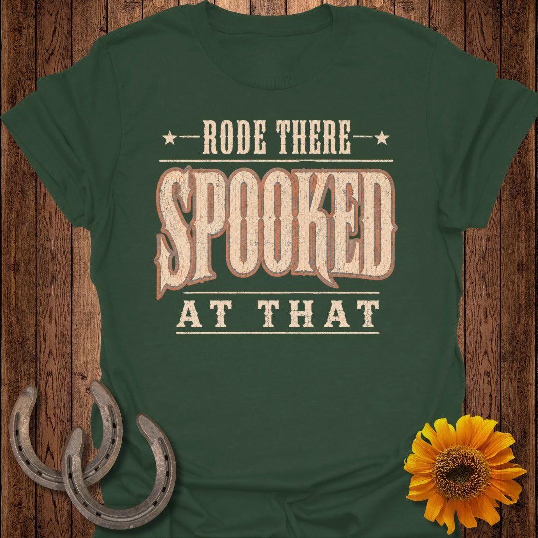 Green t-shirt with "Rode There Spooked At That" text and equestrian decor.