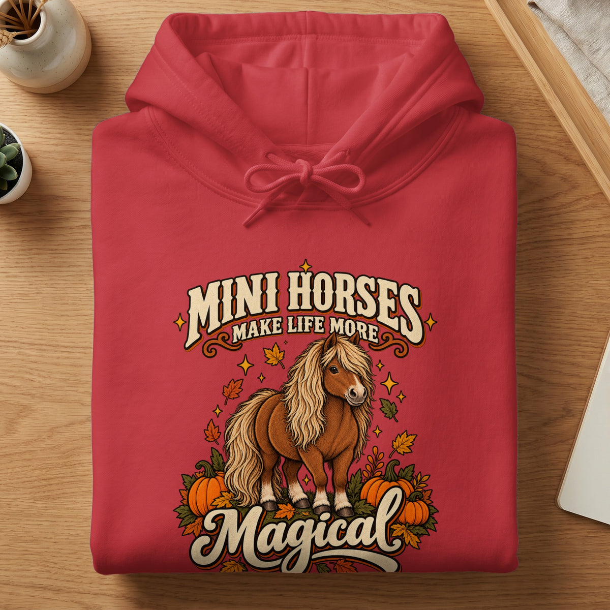 Red hoodie with "Mini Horses Make Life More Magical" graphic featuring a pony, pumpkins, and leaves.