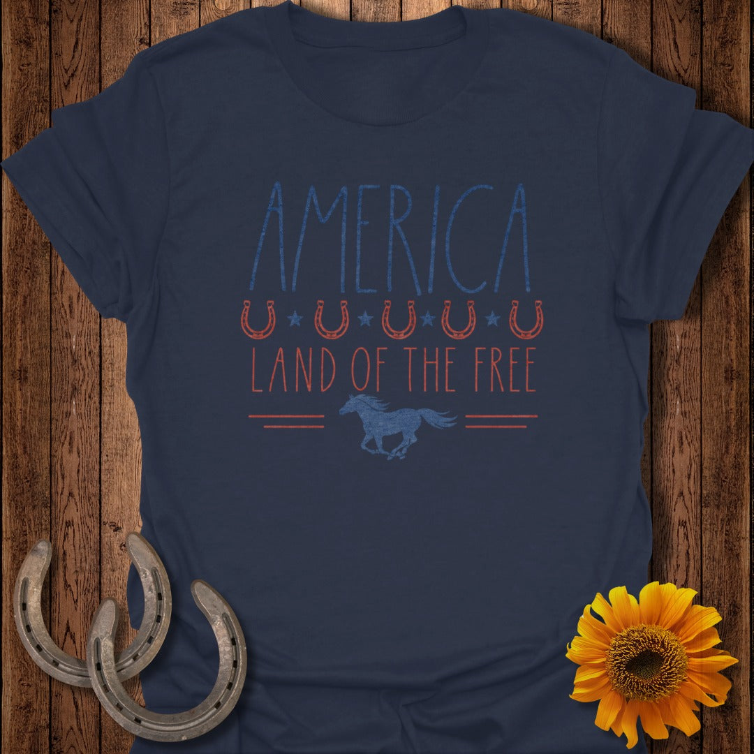 Navy t-shirt with "AMERICA LAND OF THE FREE" and a running horse design.