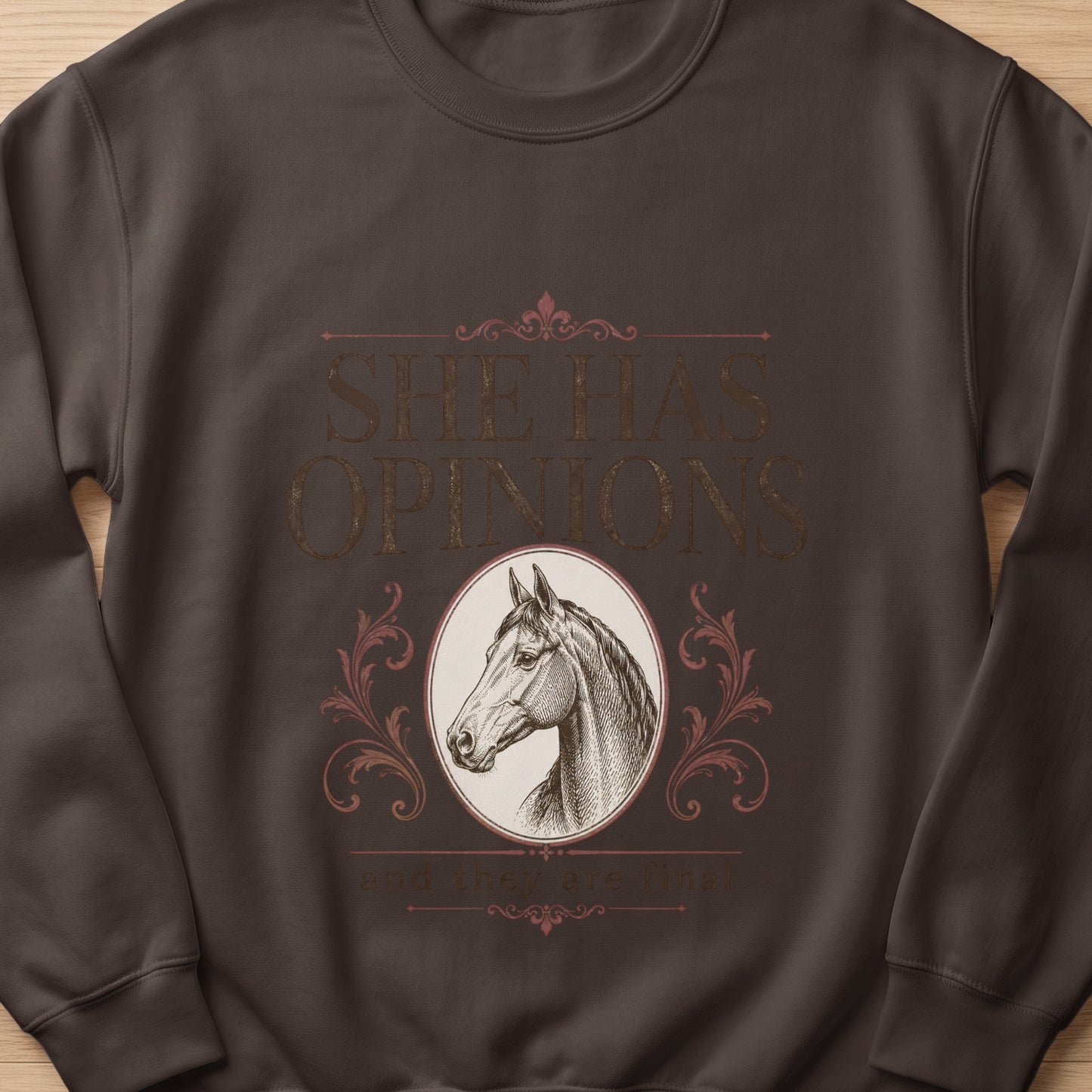 Brown sweatshirt with vintage horse head graphic and text "SHE HAS OPINIONS and they are final".