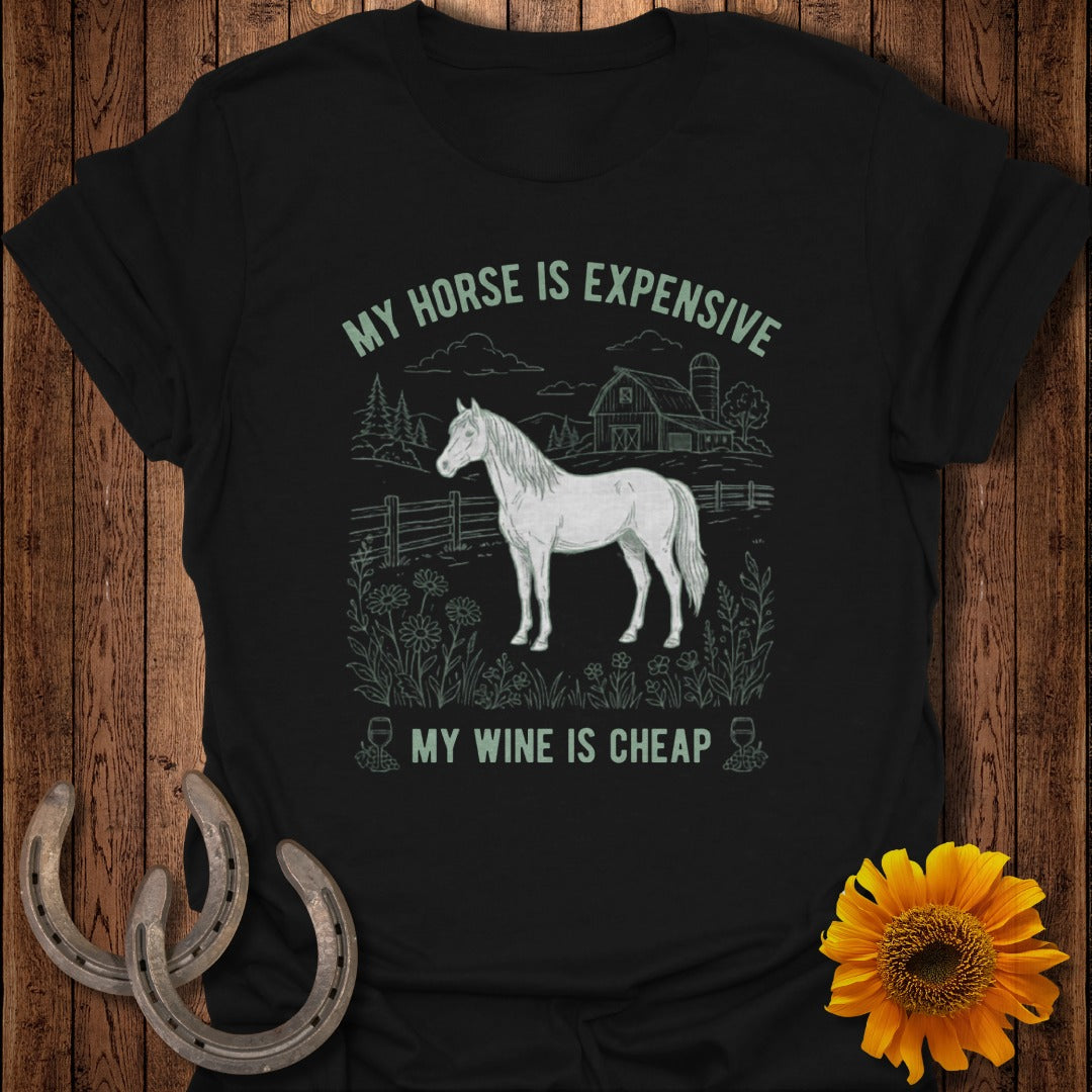 Black t-shirt with white text and line art of a horse, barn, and flowers.