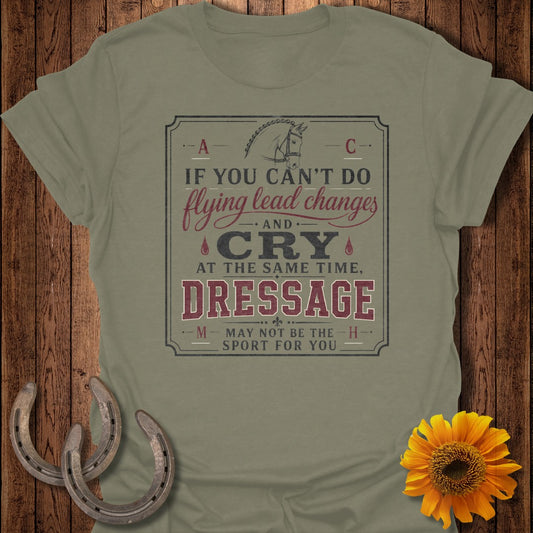 Olive t-shirt with dressage quote about flying lead changes and crying.
