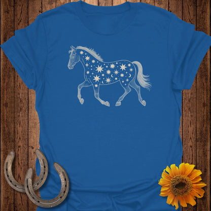 Blue t-shirt with a white outline of a horse adorned with stars and moons.