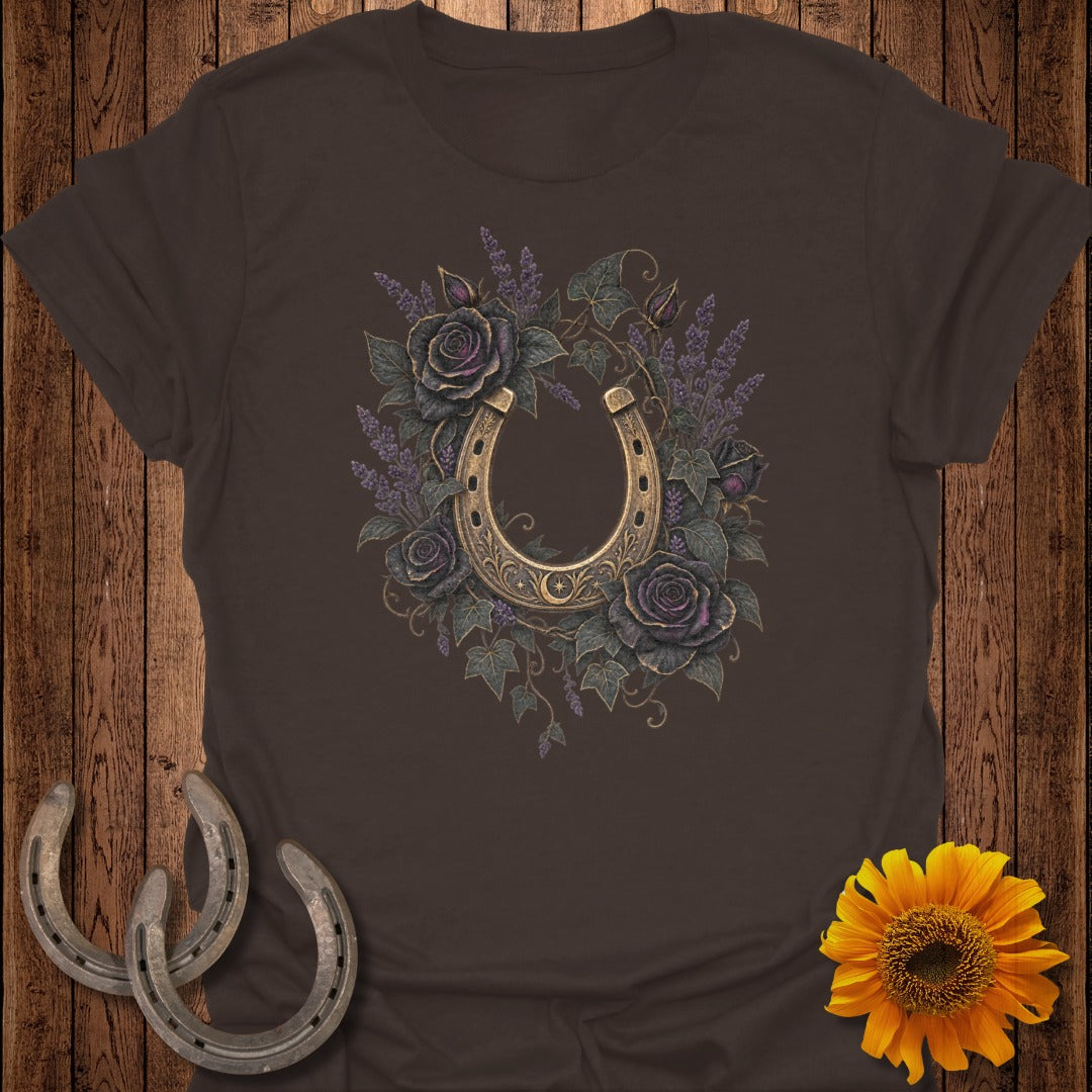 Brown t-shirt with a golden horseshoe surrounded by dark roses and lavender.