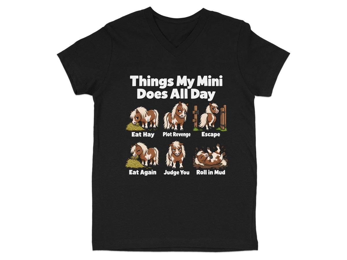 A black V-neck t-shirt featuring graphic illustrations and text describing the daily activities of a miniature horse.