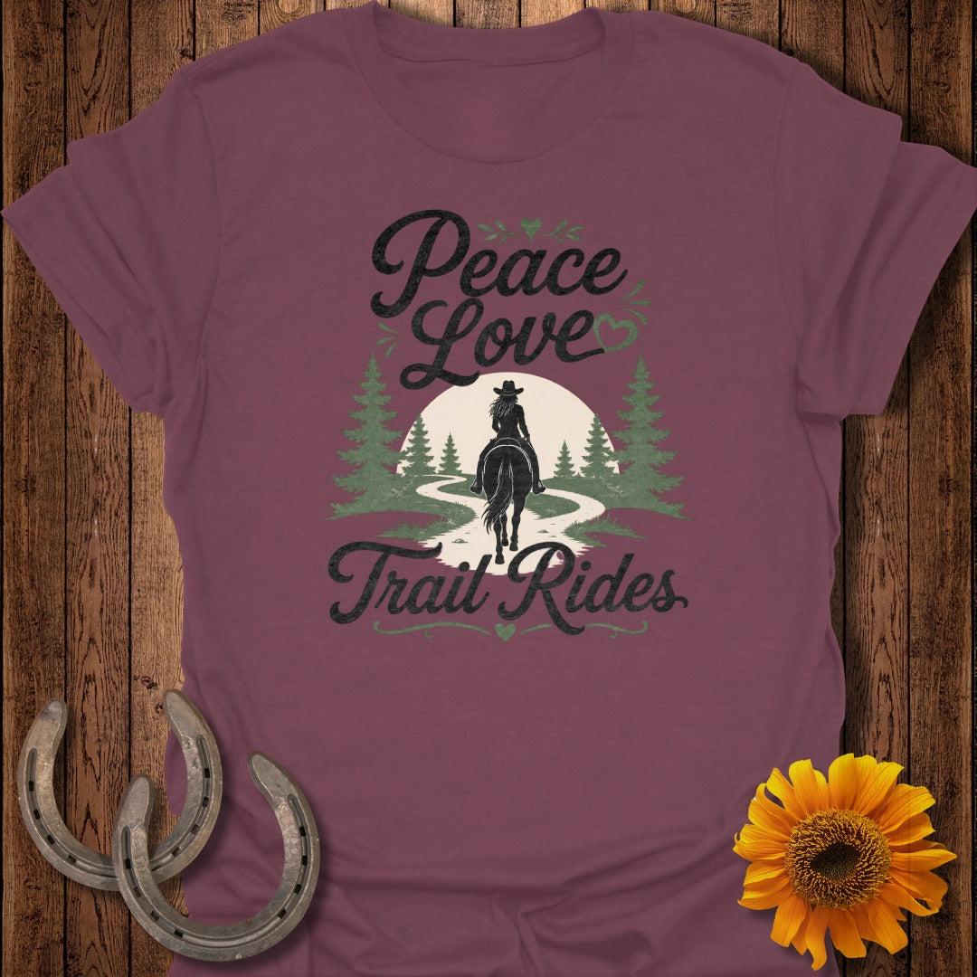 Burgundy t-shirt with "Peace Love Trail Rides" text and rider on horseback.