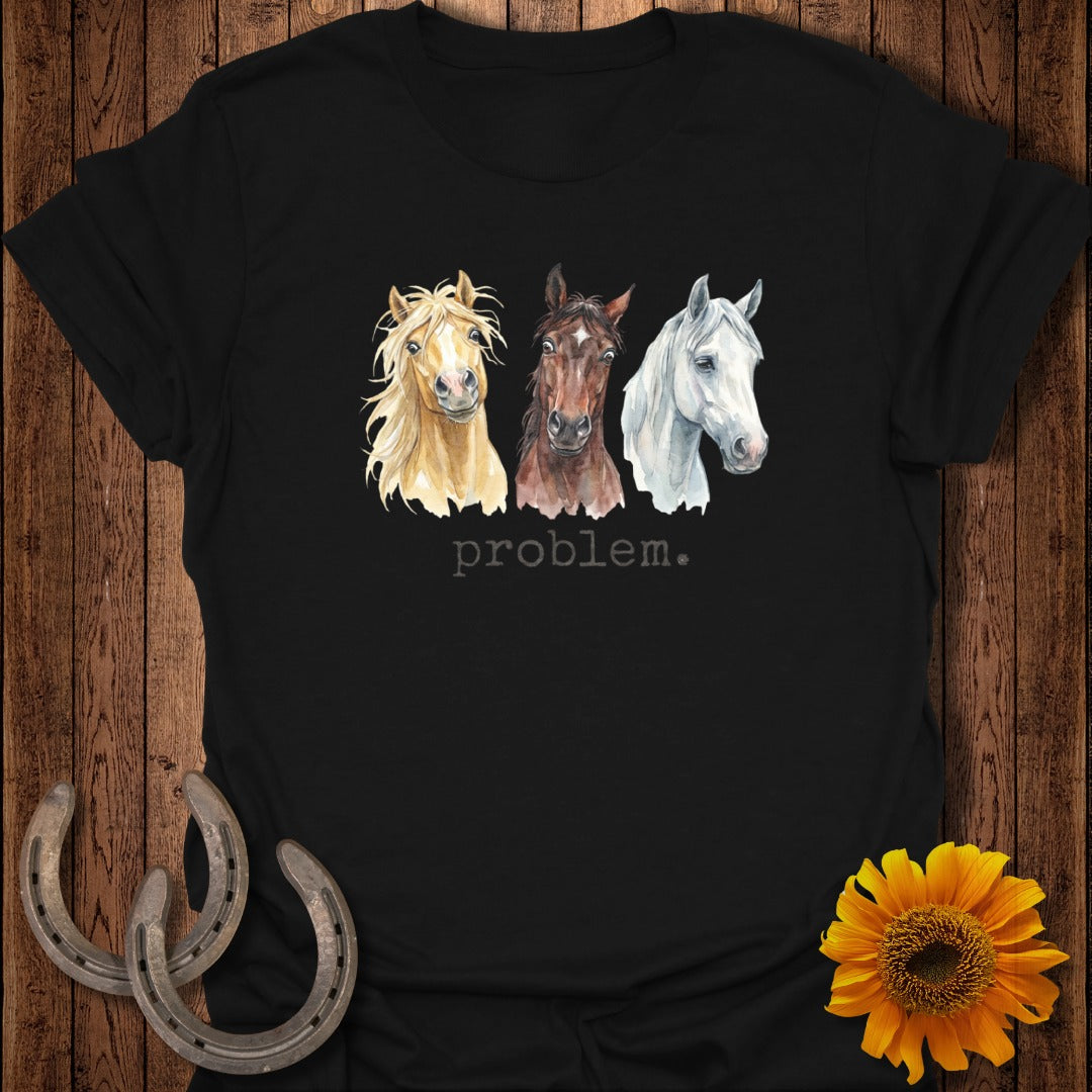 Three watercolor horses on a black t-shirt with the word "problem" below.