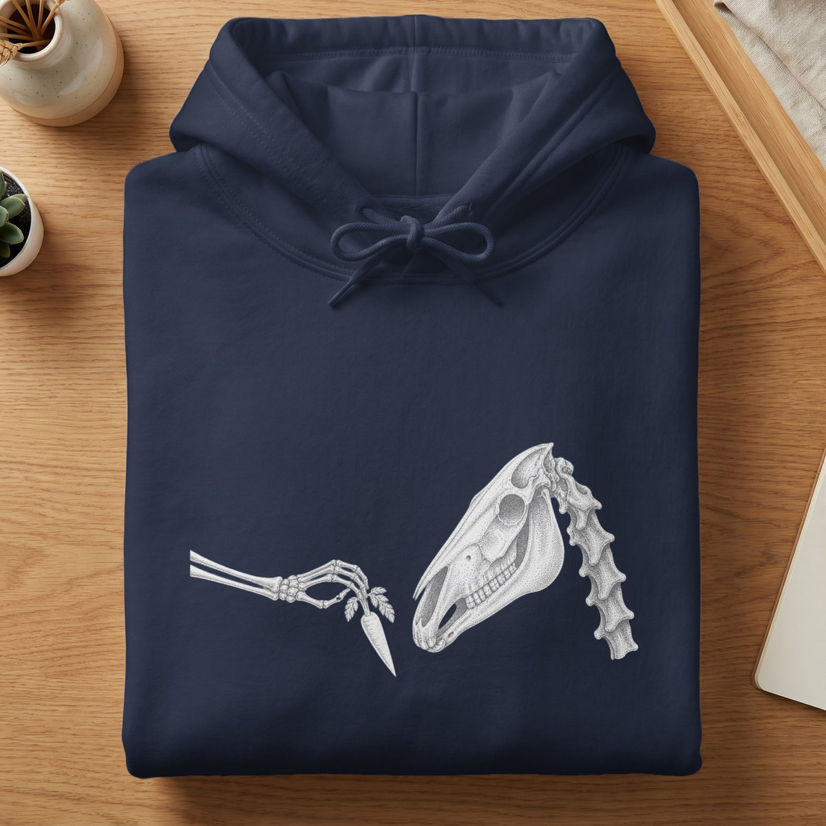 Dark navy hoodie with a skeletal horse head and skeleton hand offering a carrot.