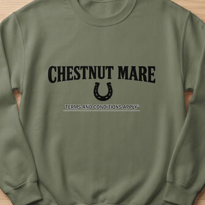 Olive green sweatshirt with black text "CHESTNUT MARE" and a horseshoe.
