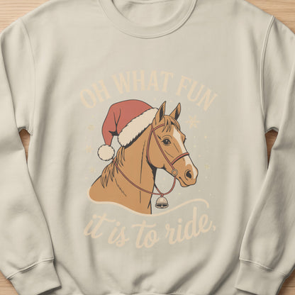 Light cream sweatshirt with horse wearing Santa hat and text "OH WHAT FUN it is to ride."
