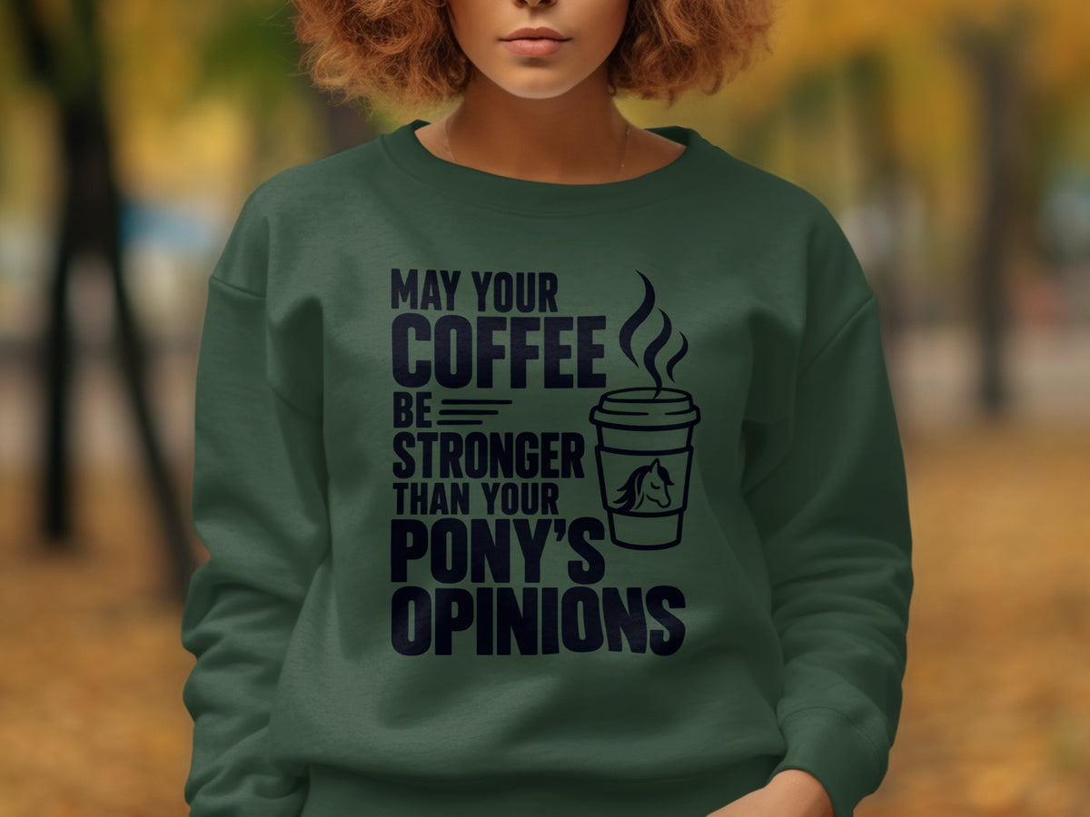 Dark green sweatshirt with text "May Your Coffee Be Stronger Than Your Pony's Opinions".
