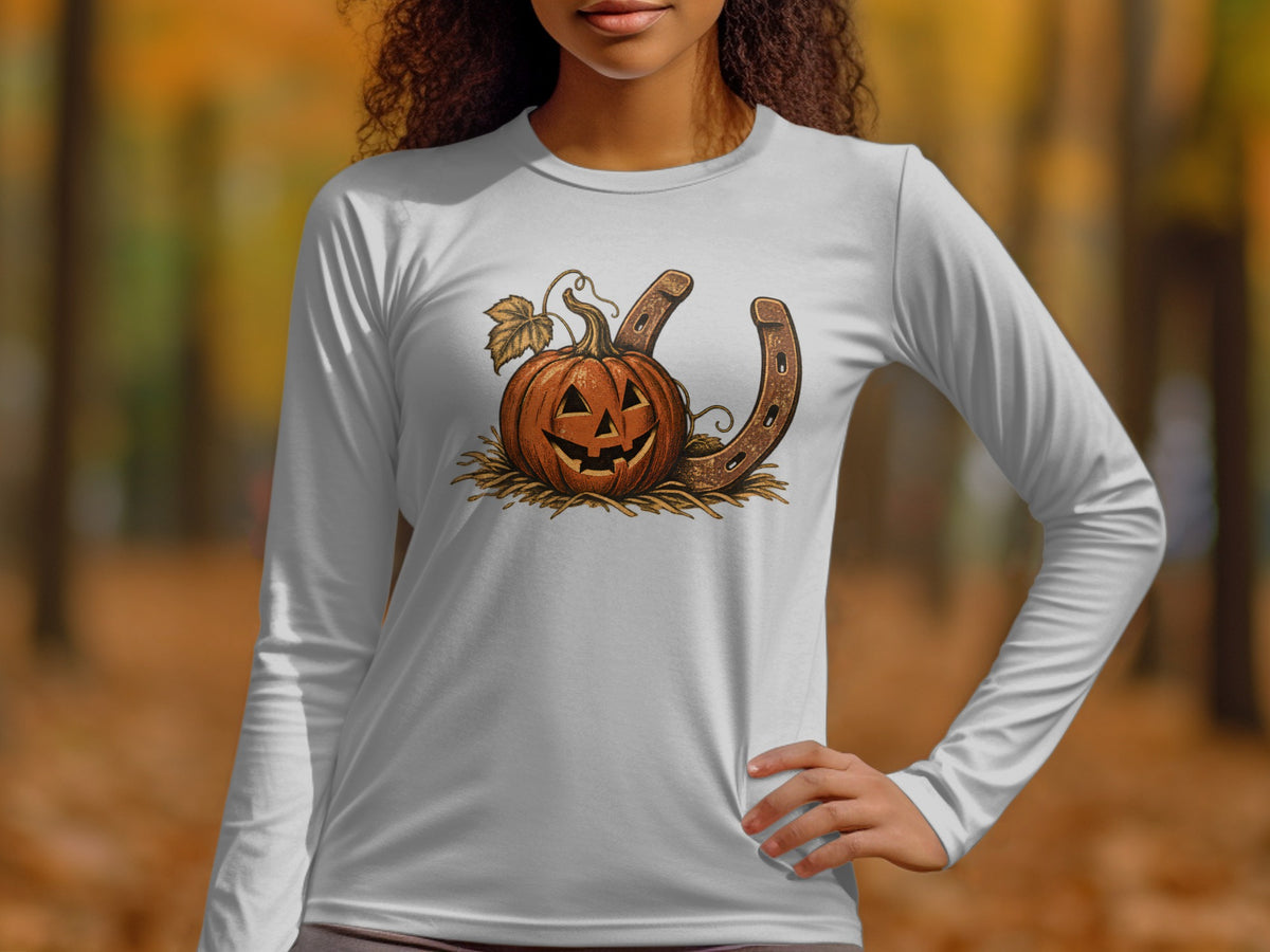 White long-sleeve shirt with a Halloween pumpkin and horseshoe graphic.