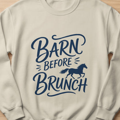 Cream sweatshirt with dark blue text "Barn Before Brunch" and a silhouette of a running horse.