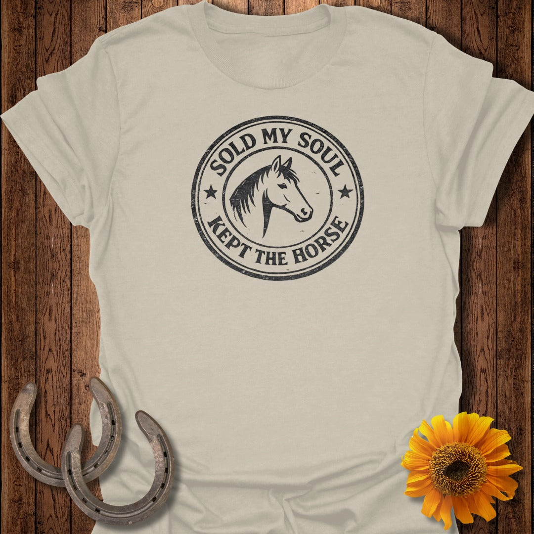 T-shirt with "Sold My Soul Kept The Horse" stamped graphic featuring a horse head.