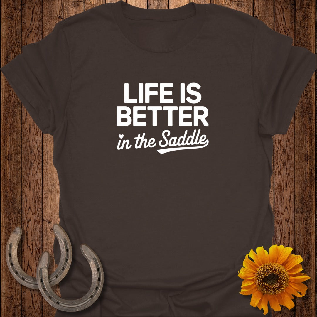 Brown t-shirt with "Life is Better in the Saddle" text, horseshoes, and sunflower.