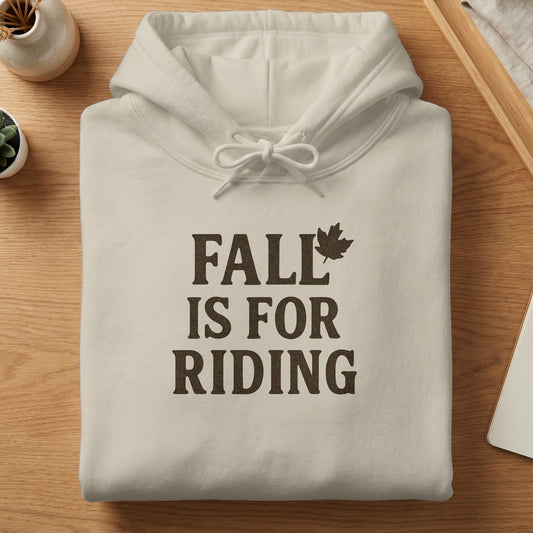 Cream hoodie with "FALL IS FOR RIDING" text and a leaf graphic.