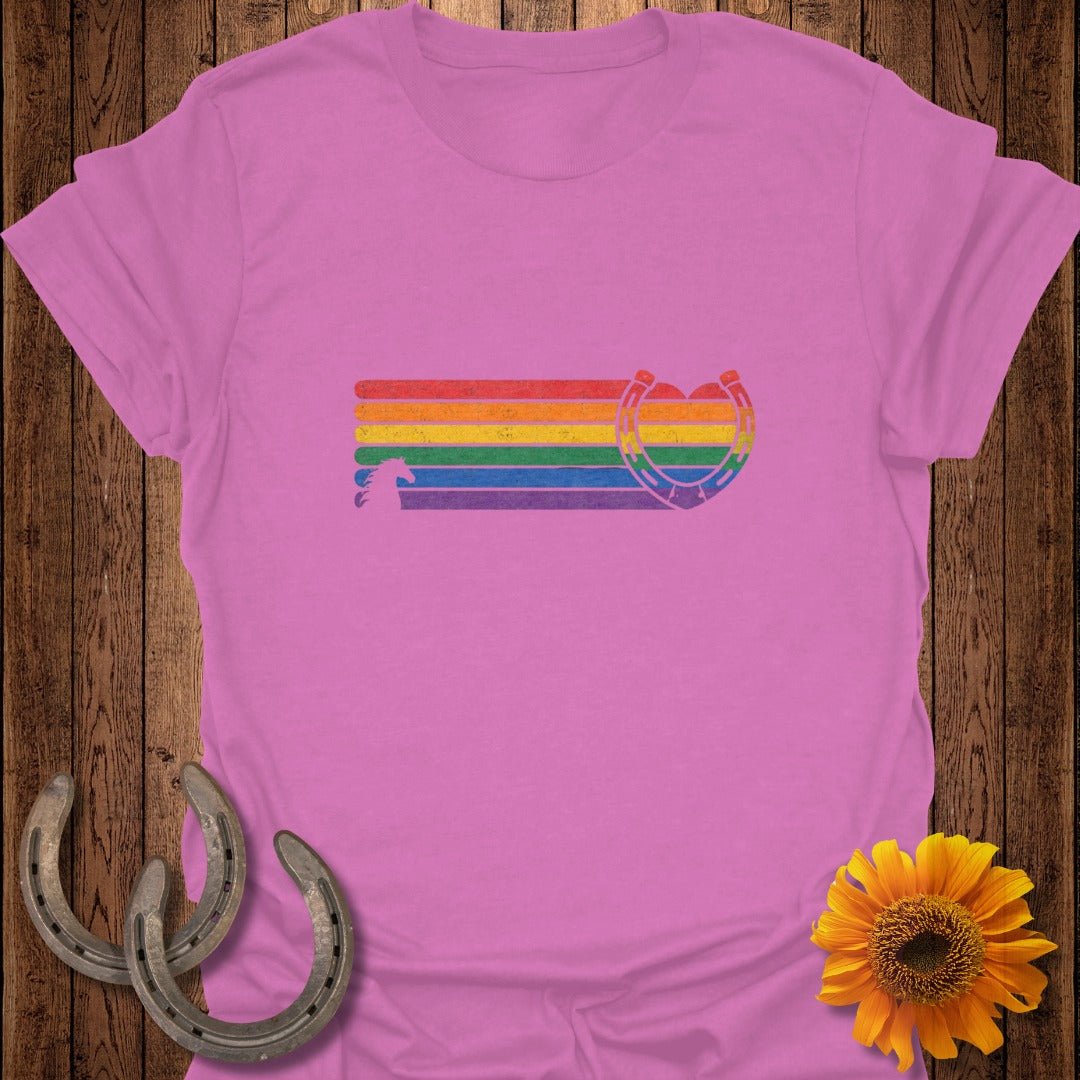 Pink t-shirt with rainbow horse and heart graphic.