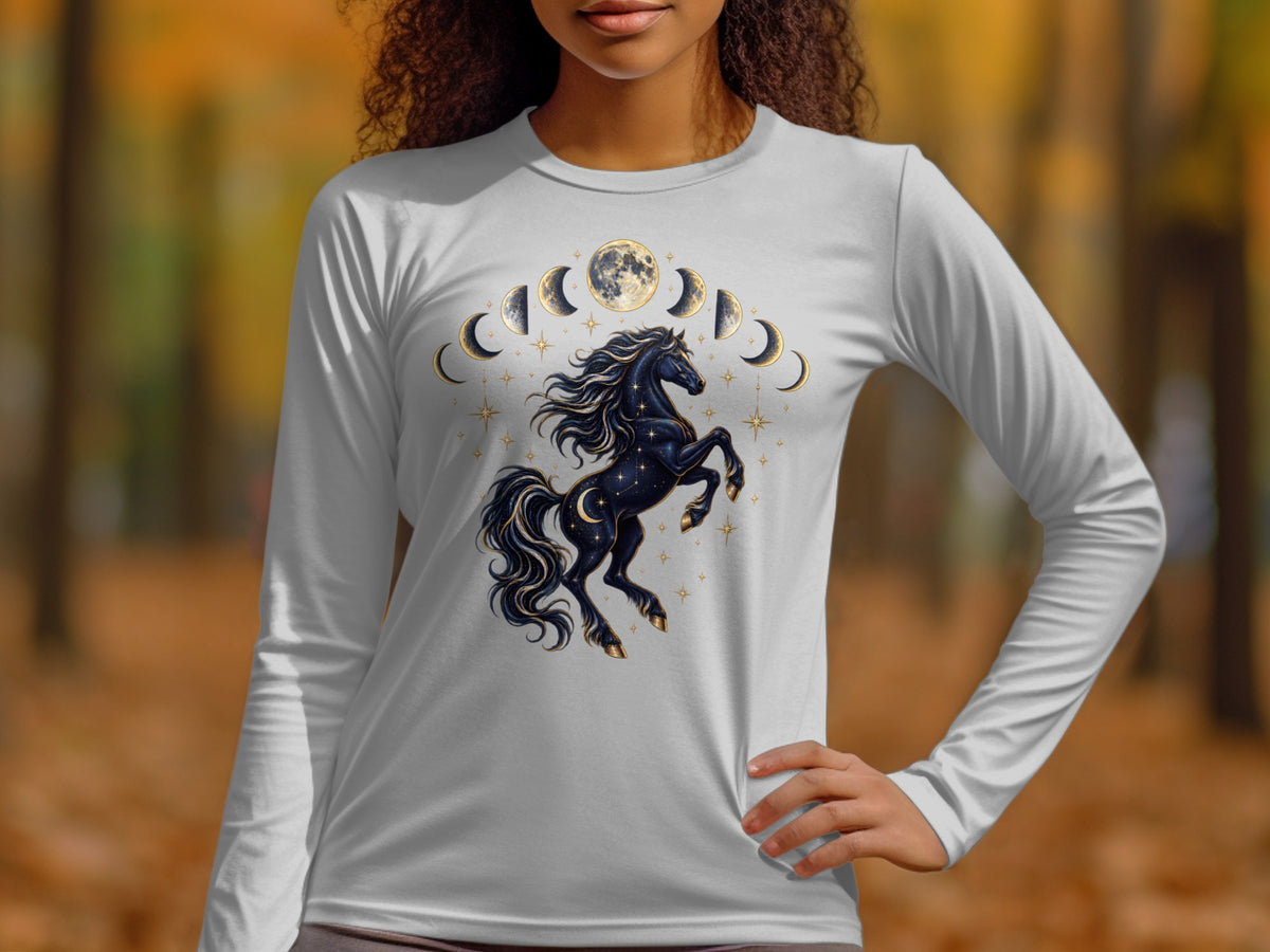 Black prancing horse with moon phases and stars graphic on a white long-sleeve shirt.