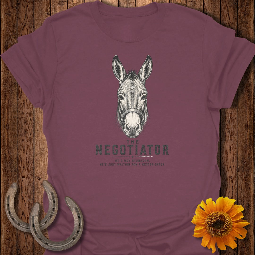 Merchandise t-shirt featuring a charcoal sketch of a donkey's head with "The Negotiator" text.