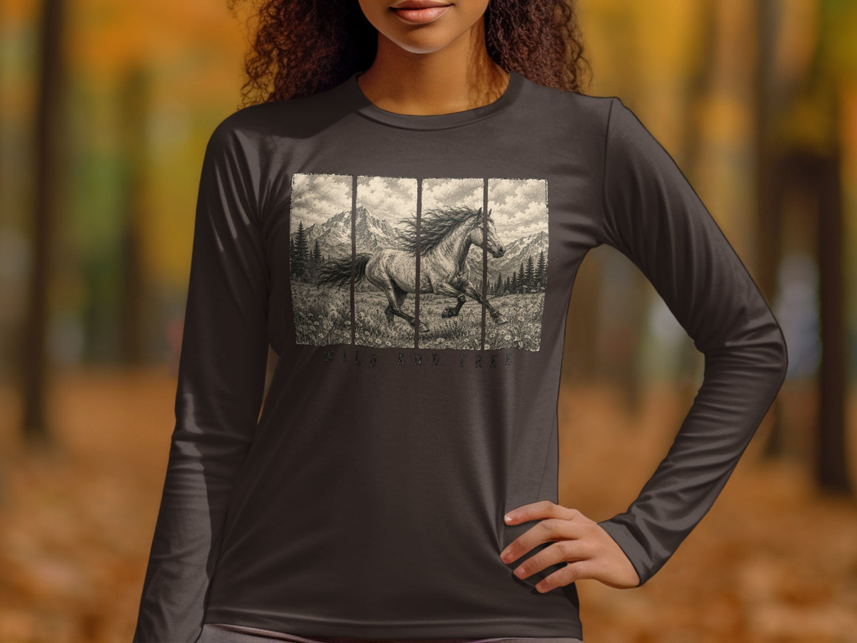 Long sleeve shirt with a black and white drawing of a running horse and mountains, text "WILD AND FREE".