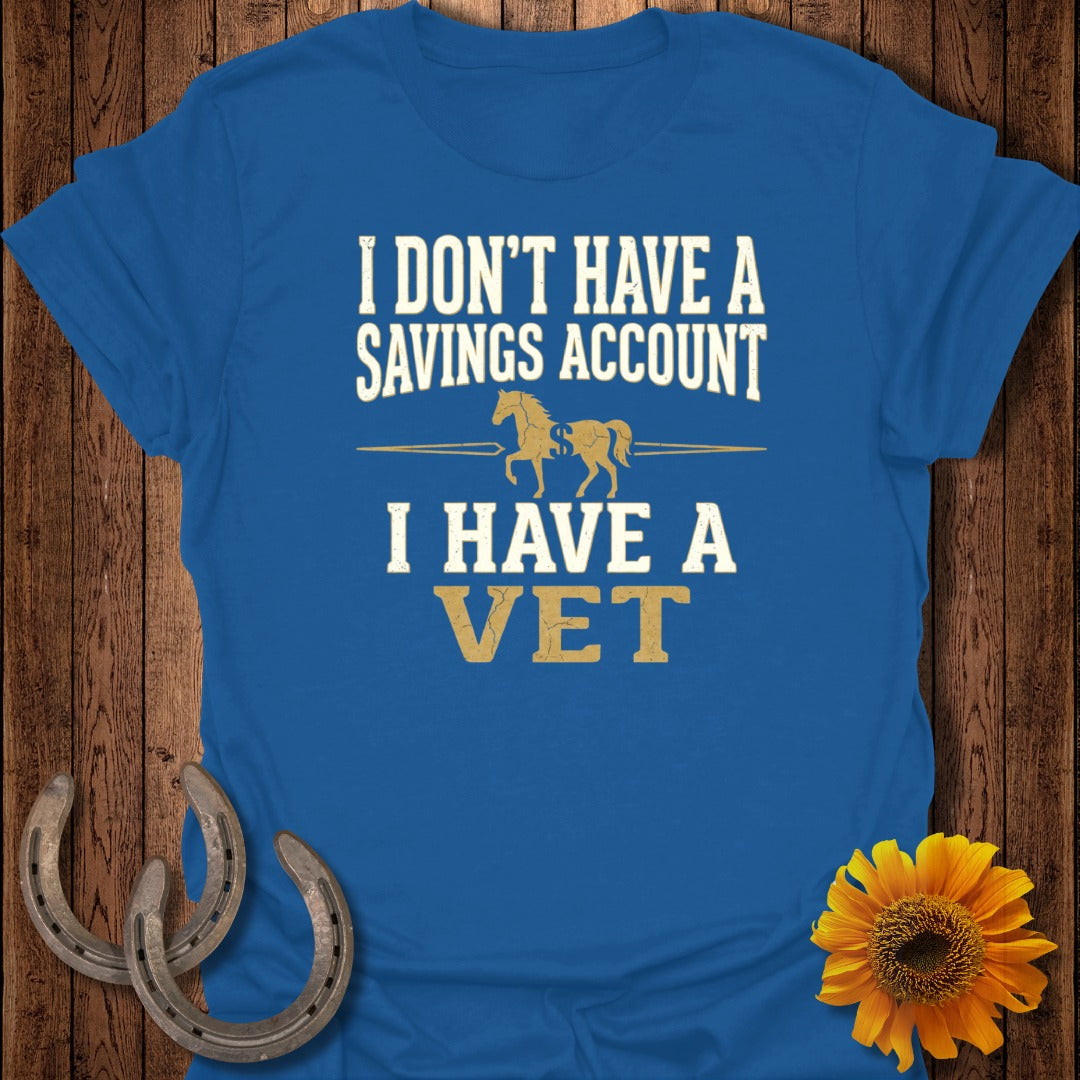 Blue t-shirt with text "I DON'T HAVE A SAVINGS ACCOUNT" and a horse graphic.
