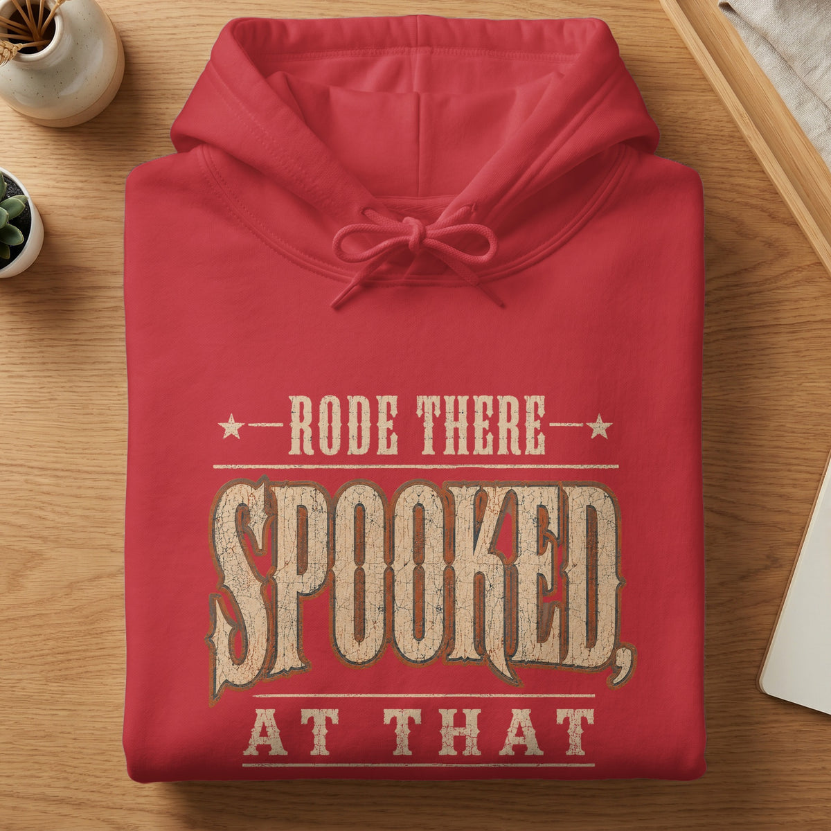 Red hoodie with text "Rode There Spooked, At That"