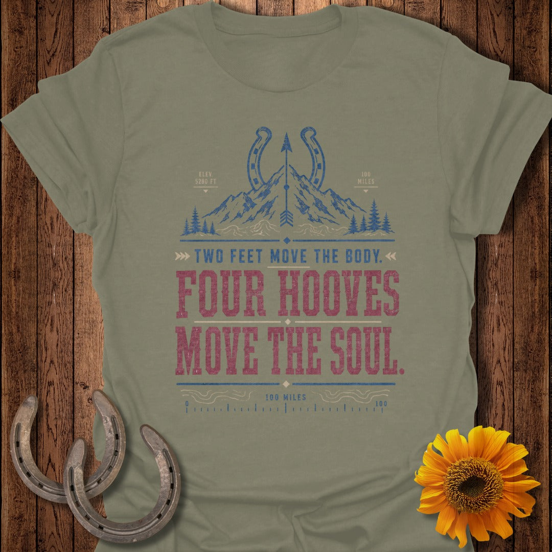 T-shirt with mountains, horseshoes, text: "FOUR HOOVES MOVE THE SOUL."