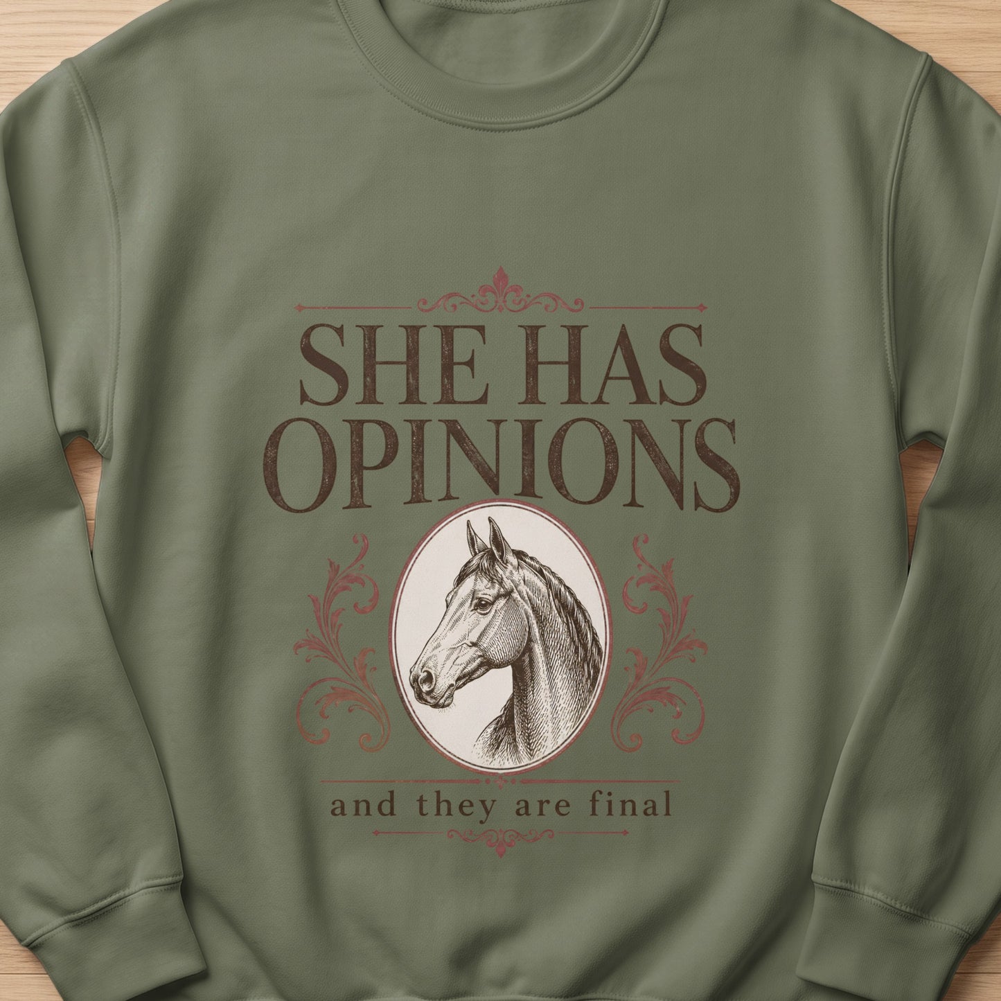 Green sweatshirt with horse graphic and text "SHE HAS OPINIONS and they are final".