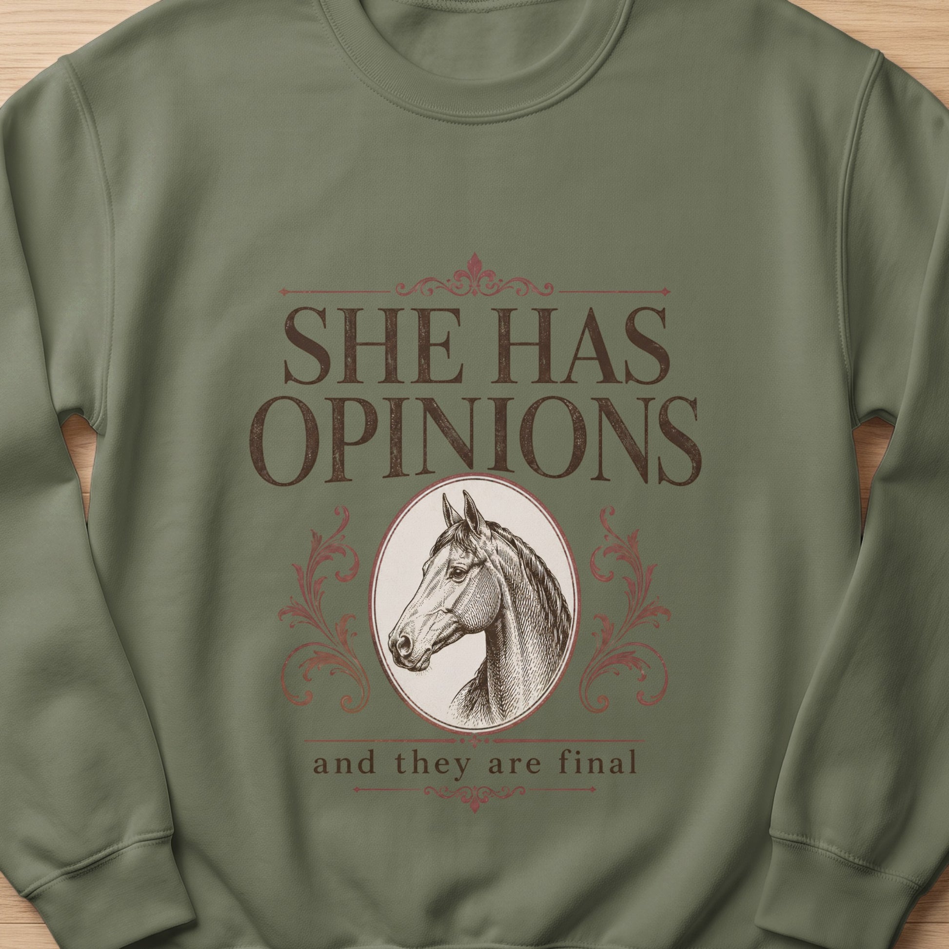 Green sweatshirt with horse graphic and text "SHE HAS OPINIONS and they are final".