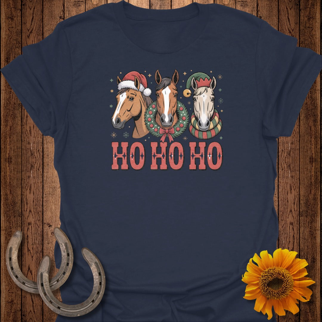 Three horses wearing Christmas hats and scarves with "HO HO HO" text.