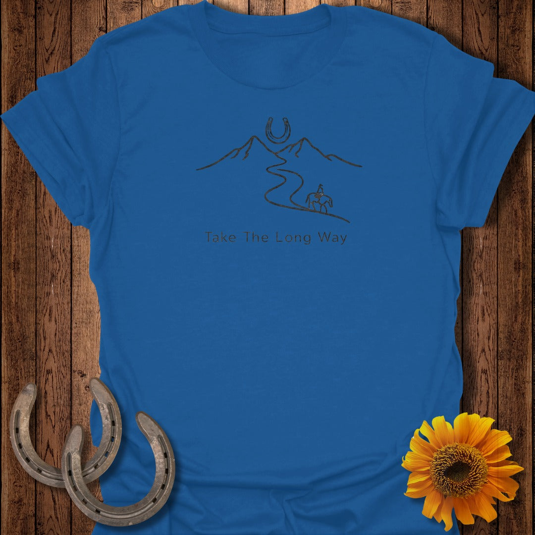 Blue t-shirt with mountain, horseshoe, and rider graphic and "Take The Long Way" text.