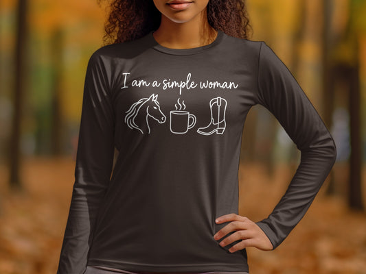 Long sleeve shirt with horse, coffee, and cowboy boot graphic and text.
