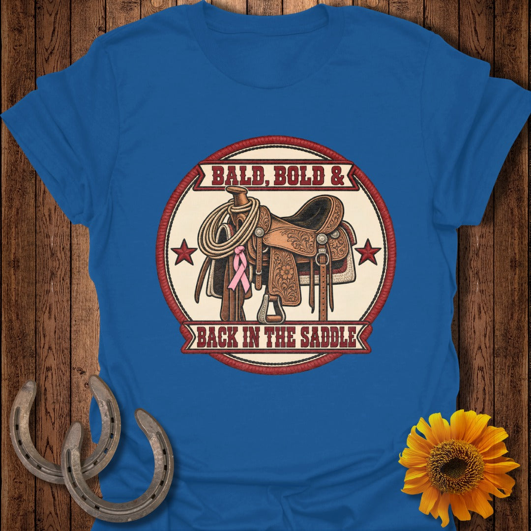 Blue t-shirt with a Western saddle, rope, and pink ribbon graphic with text.