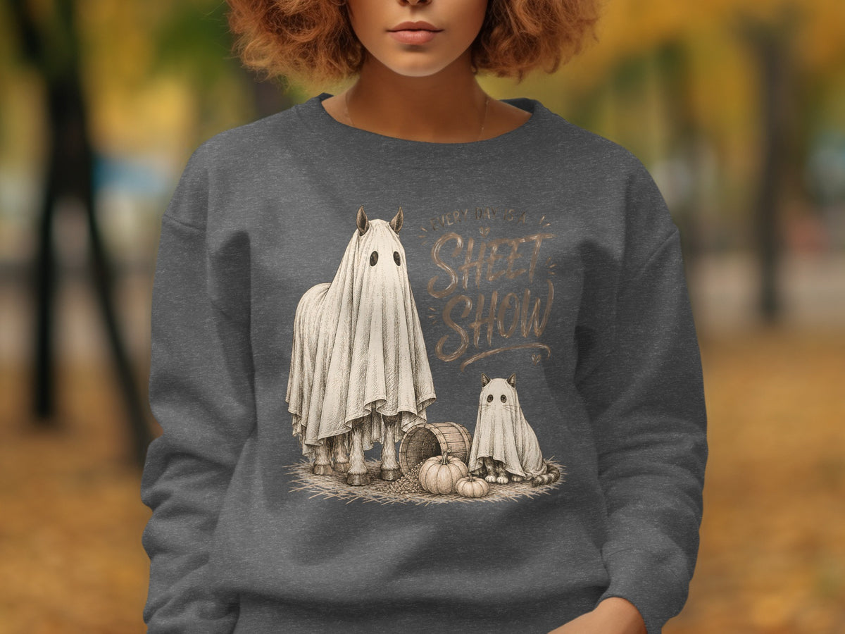 Horse and cat in ghost costumes with pumpkins and text "Every Day Is A Sheet Show".