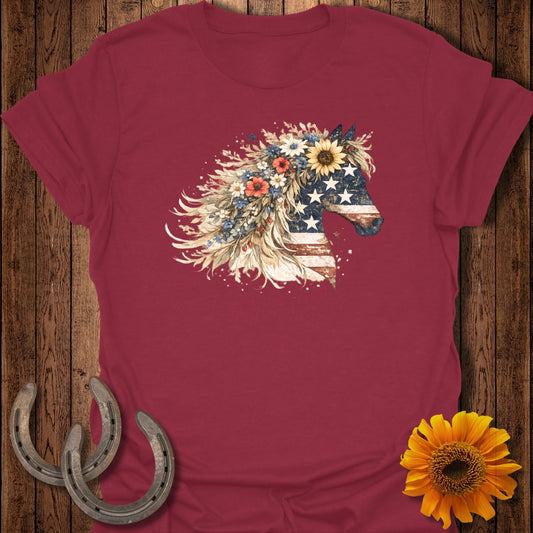 Maroon t-shirt featuring a horse silhouette with an American flag mane and floral accents.