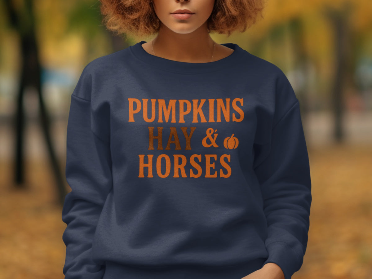 Navy sweatshirt with orange text: "PUMPKINS HAY & HORSES".