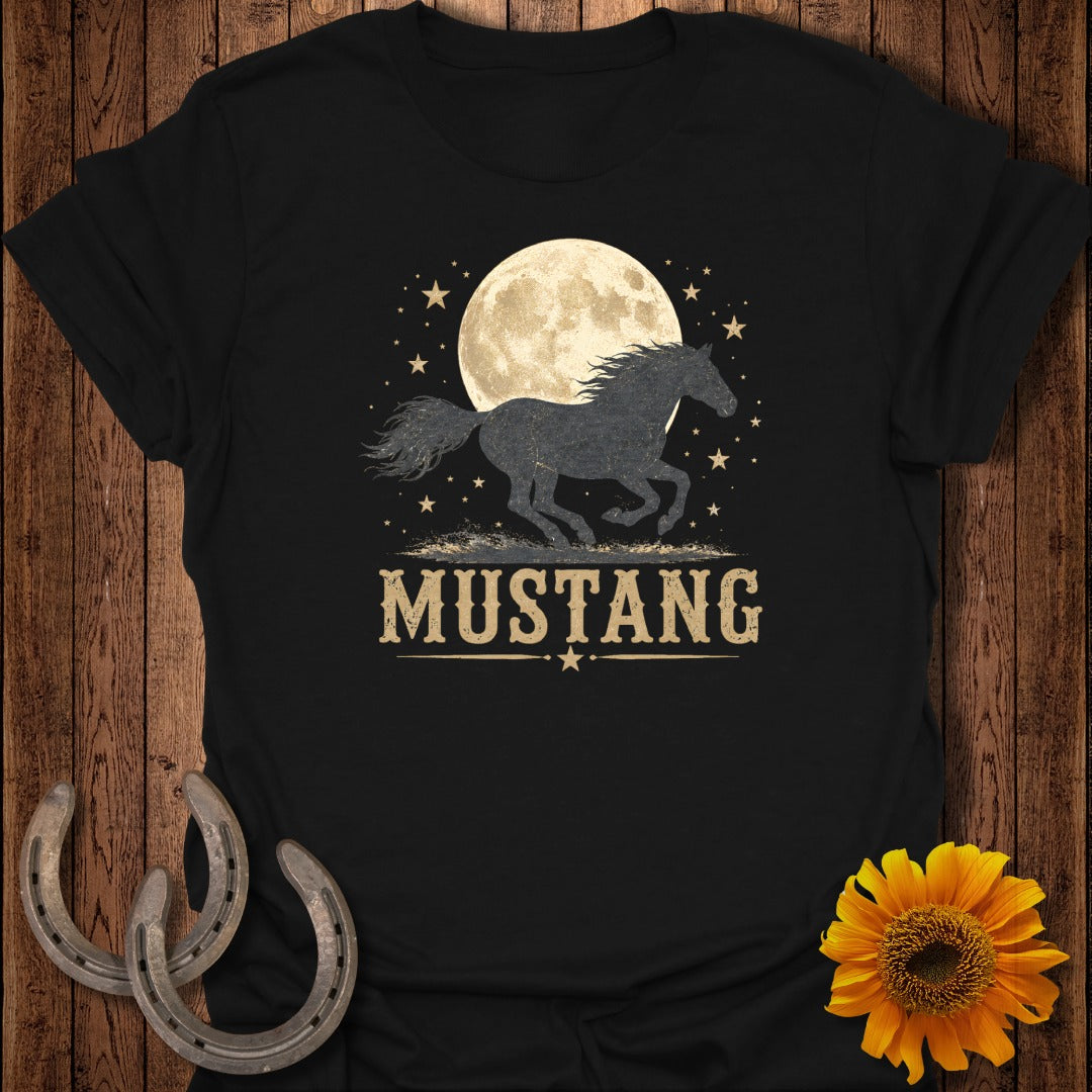 Black t-shirt with silhouette of a running horse under a full moon and stars.