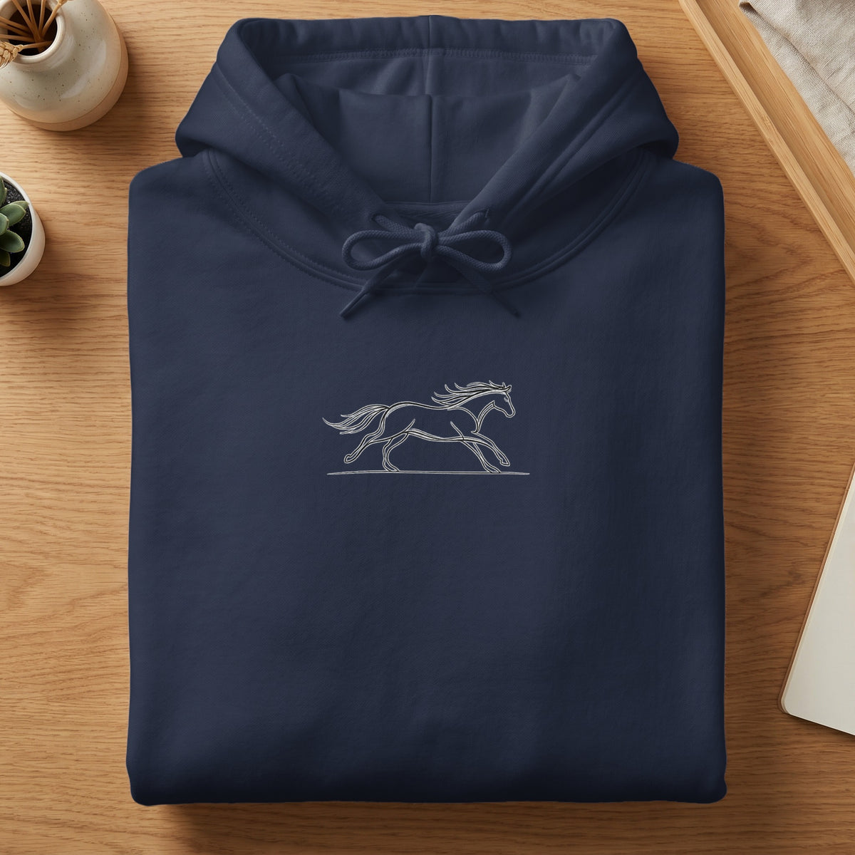 Navy hoodie with a white embroidered horse design on the front.