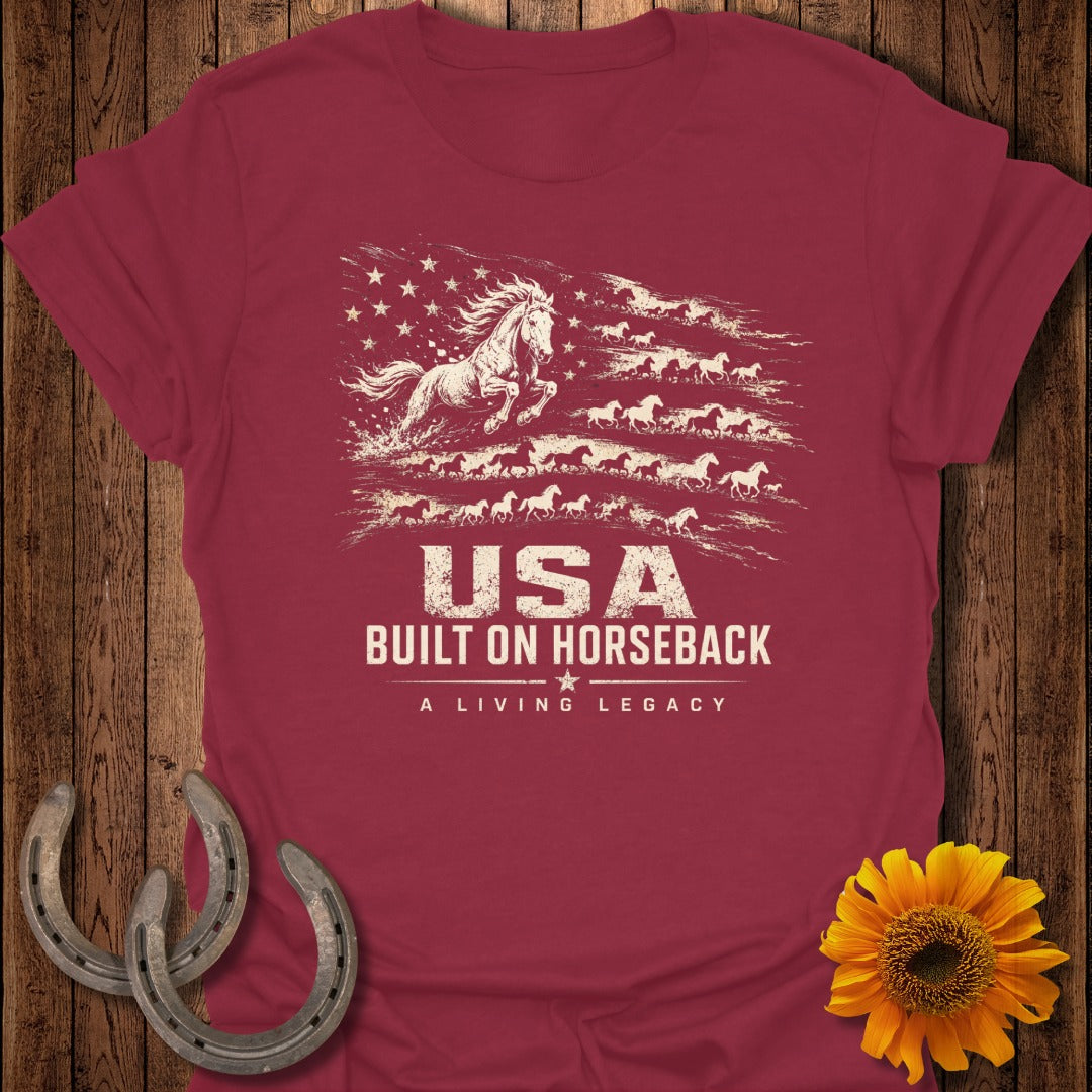 T-shirt with American flag design made of running horses and text "USA BUILT ON HORSEBACK".