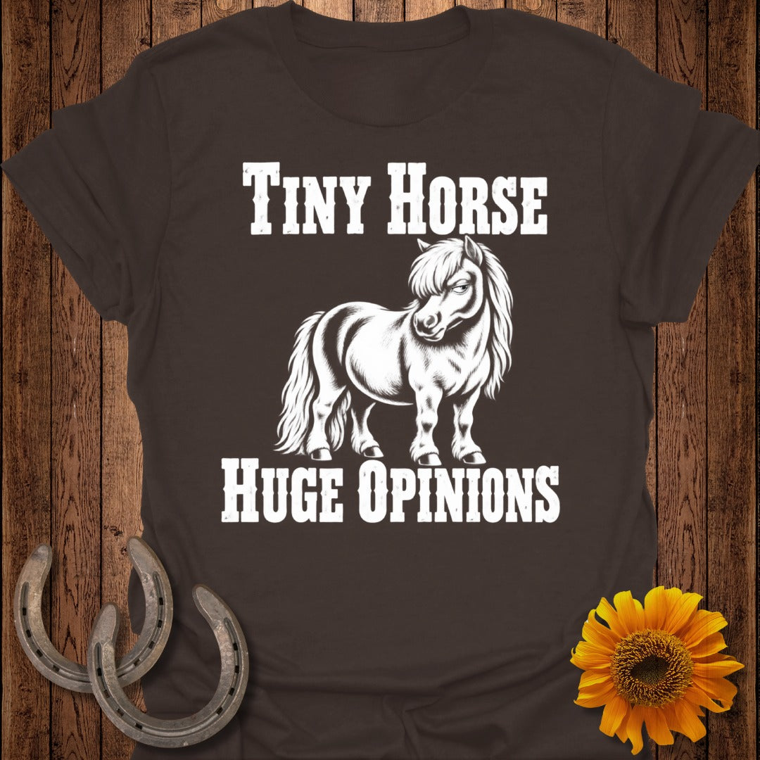 Brown t-shirt with a white graphic of a pony and text "Tiny Horse Huge Opinions."
