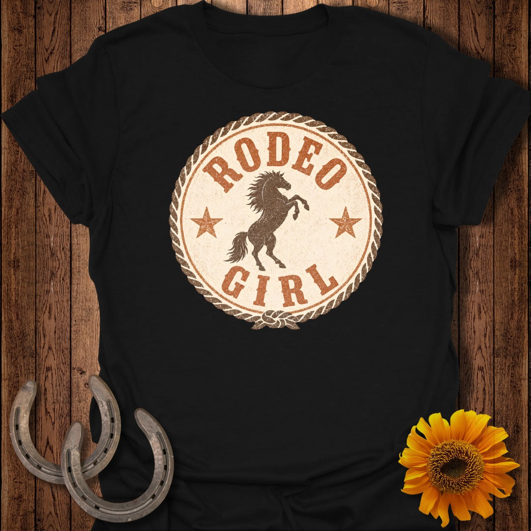 Black t-shirt with "Rodeo Girl" text and a bucking horse graphic.