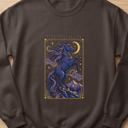 The Wild Mare text above a dark blue horse rearing by a crescent moon and stars.