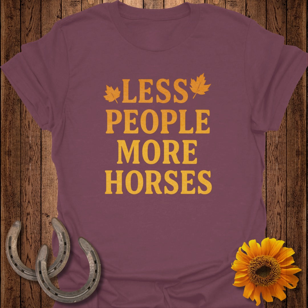Plum t-shirt with yellow text "LESS PEOPLE MORE HORSES" and maple leaves.